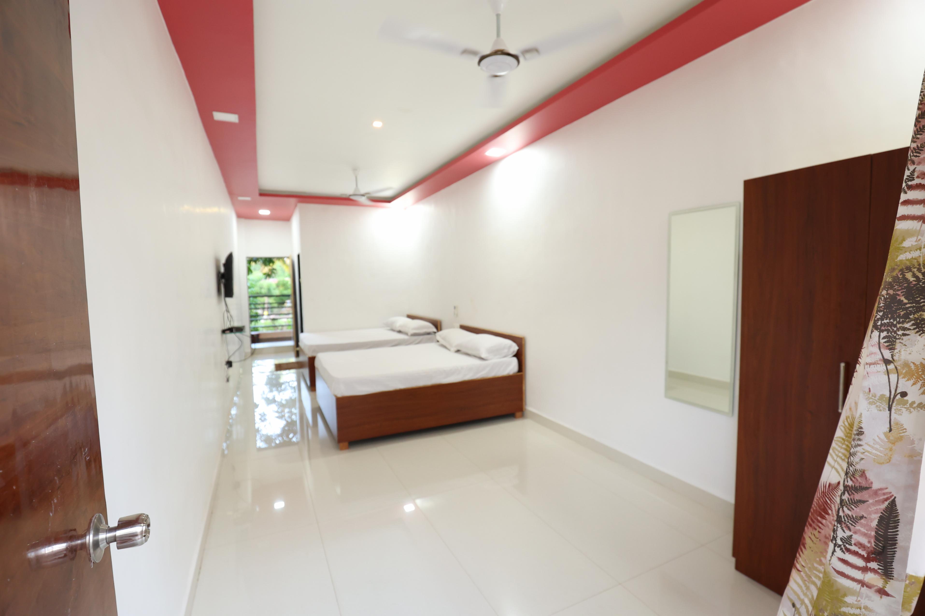 USHA RESORT Room Type - Basic Deluxe AC (Four People)
