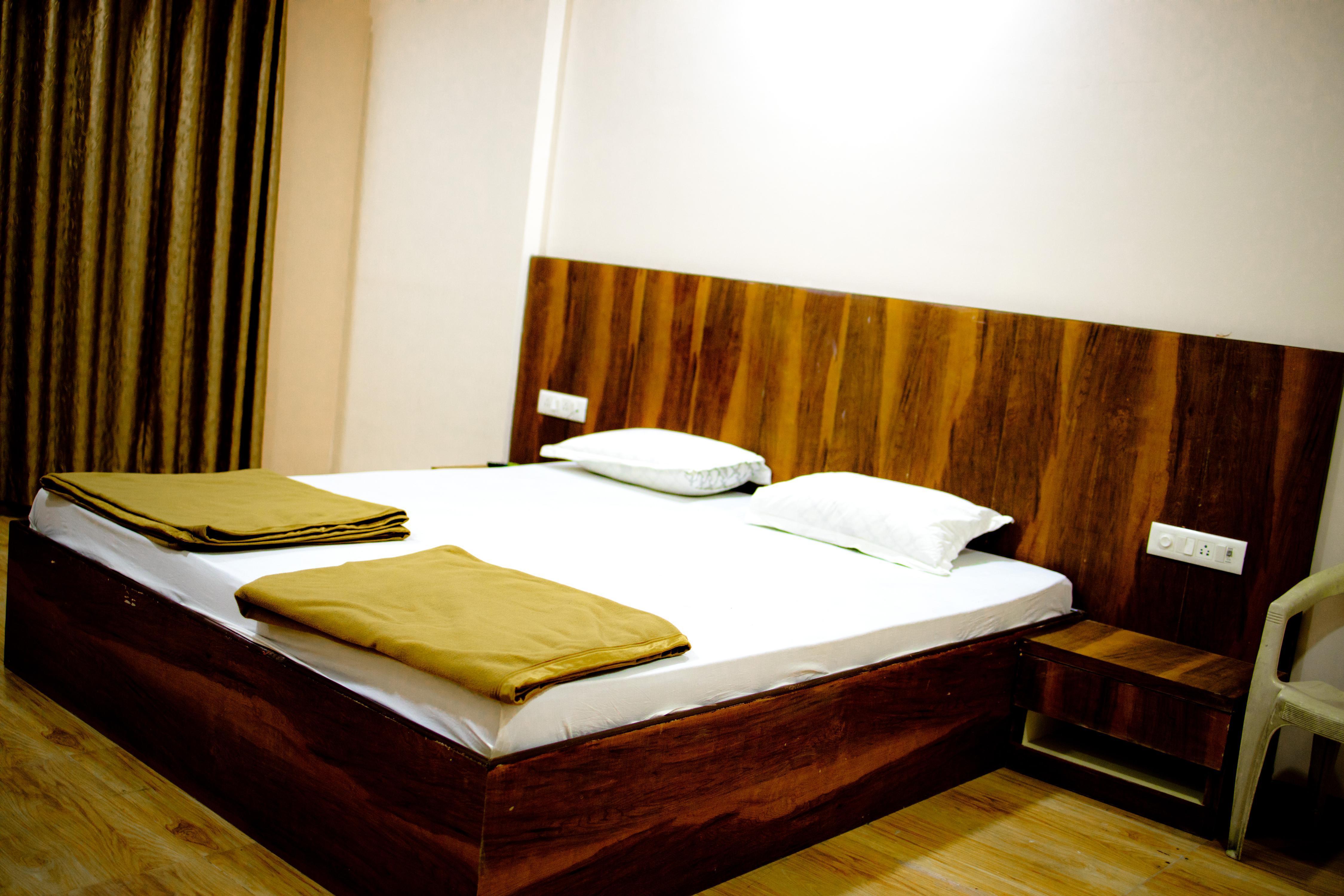 Vishal International Lodge Room Type - Deluxe AC Room