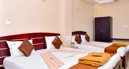 Hotel Shri Kannika Room Type - Four Bed Room AC ( Vallet Parking )