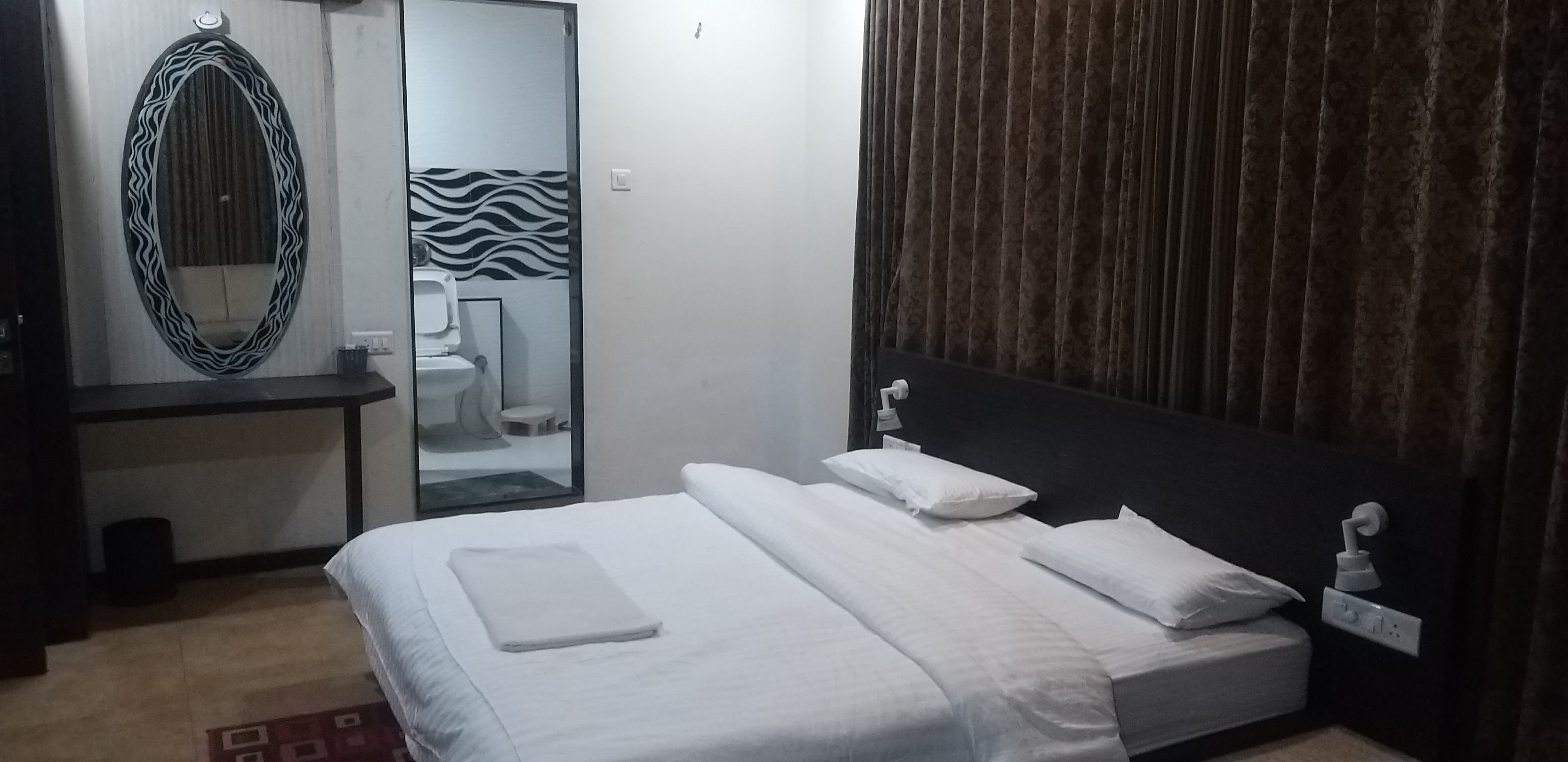 HOTEL SHREENATH PRIDE - Tap to explore photos