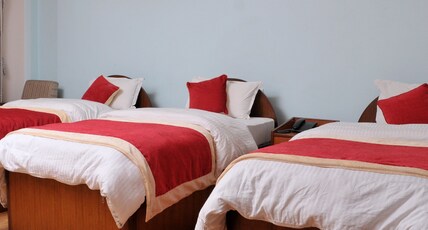 Hotel Brihaspati Room Type - Deluxe Triple bed Room