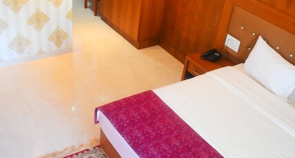 Jyothis Residency Room Type - Deluxe Room AC