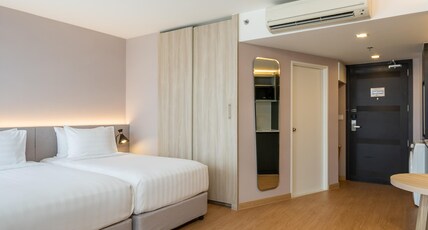Aster Hotel and Residence Room Type - Grand Deluxe Twin