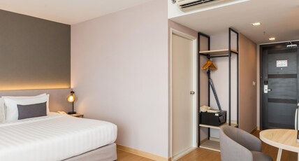 Aster Hotel and Residence Room Type - New Deluxe