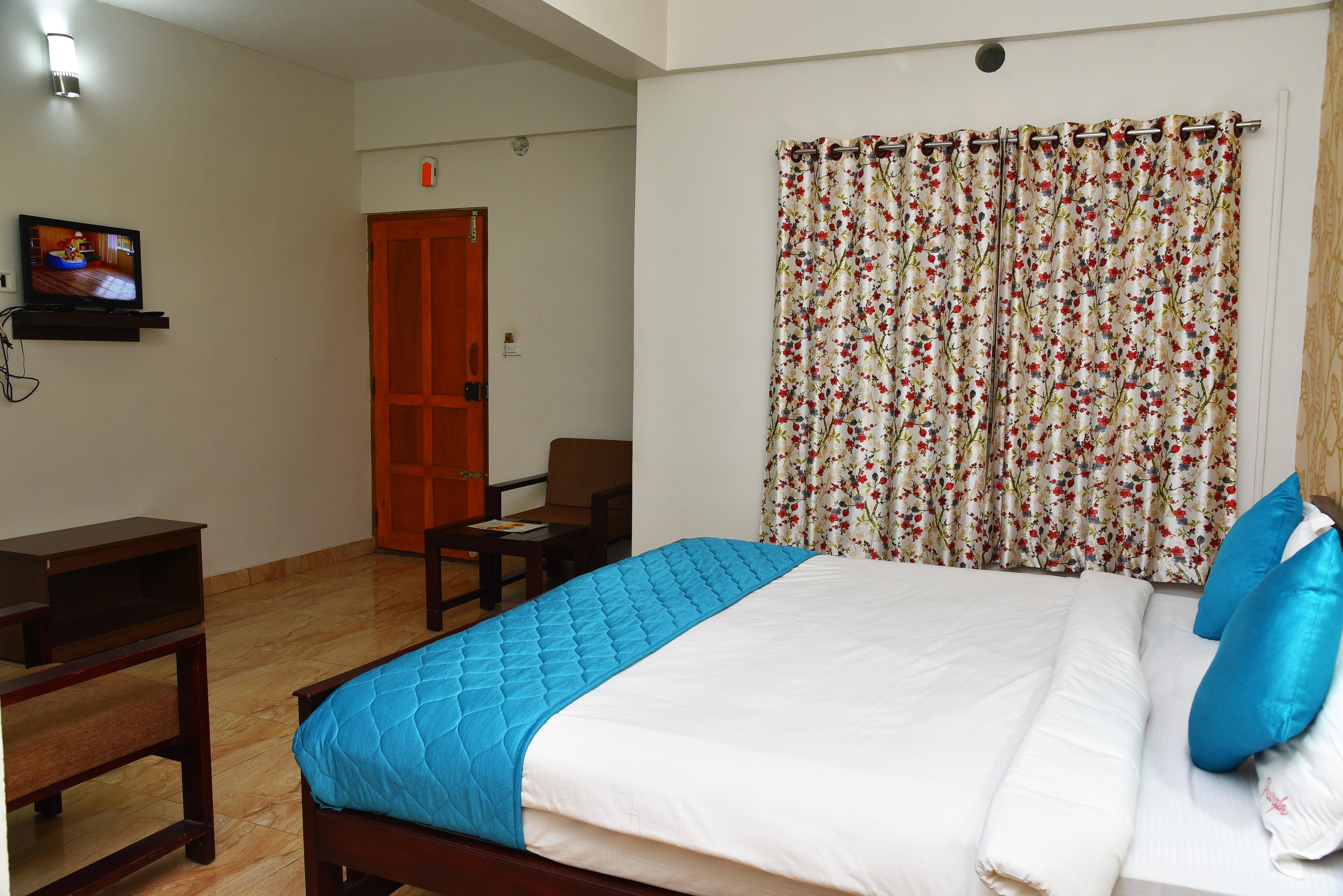 Purple Munnar - Tap to explore photos