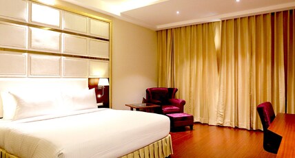 Hotel Kasturi Orchid Room Type - DELUXE ROOM Hotel Kasturi Orchid Room Type - DELUXE ROOM