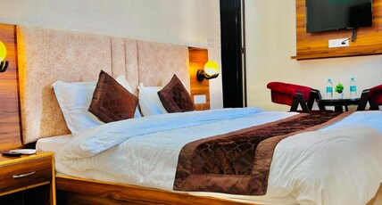Trinetra guest house Room Type - Signature Room with Ganga View