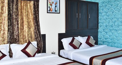 Barnabas Homestay Room Type - Deluxe Four Bed AC Room