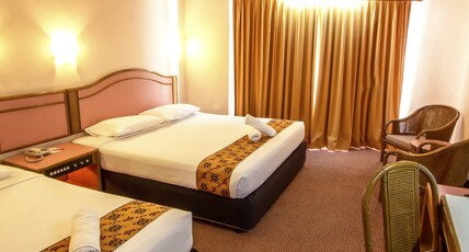 Hotel Grand Continental Room Type - DELUXE TRIPLE Hotel Grand Continental Room Type - DELUXE TRIPLE