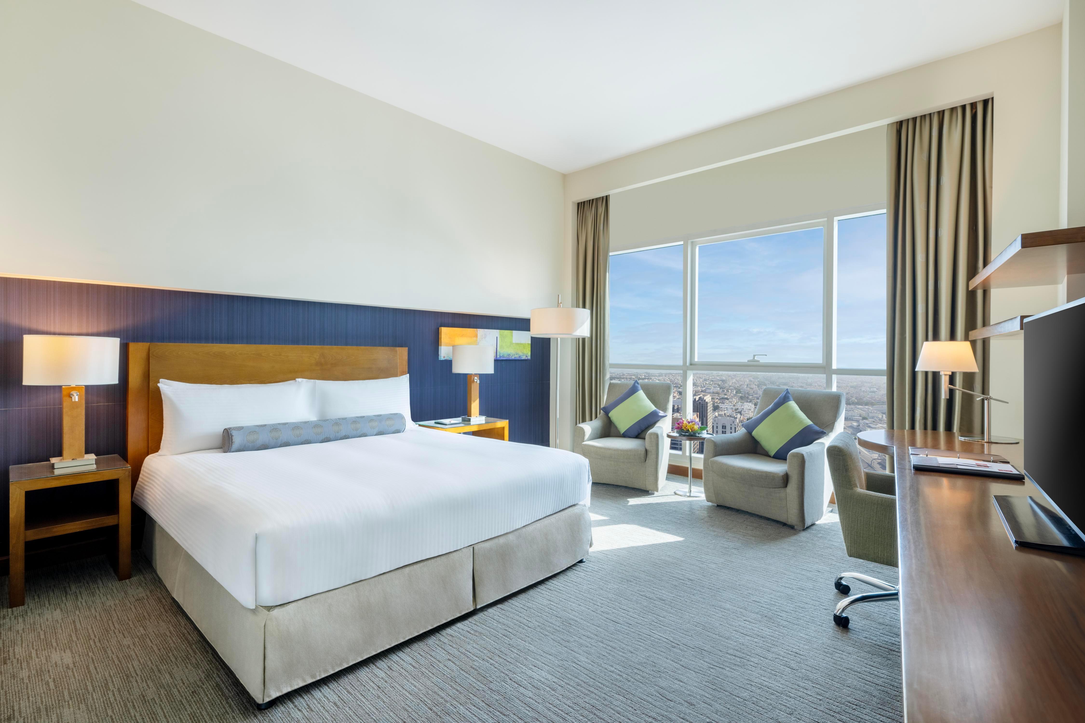 Grand Millennium Al Wahda Hotel and Executive Apartments Abu Dhabi - Tap to explore photos