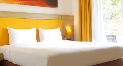 BloomSuites | Calangute  Room Type - Superior King Room