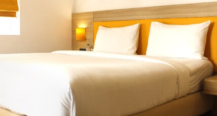 BloomSuites | Calangute  Room Type - Deluxe Suite Room