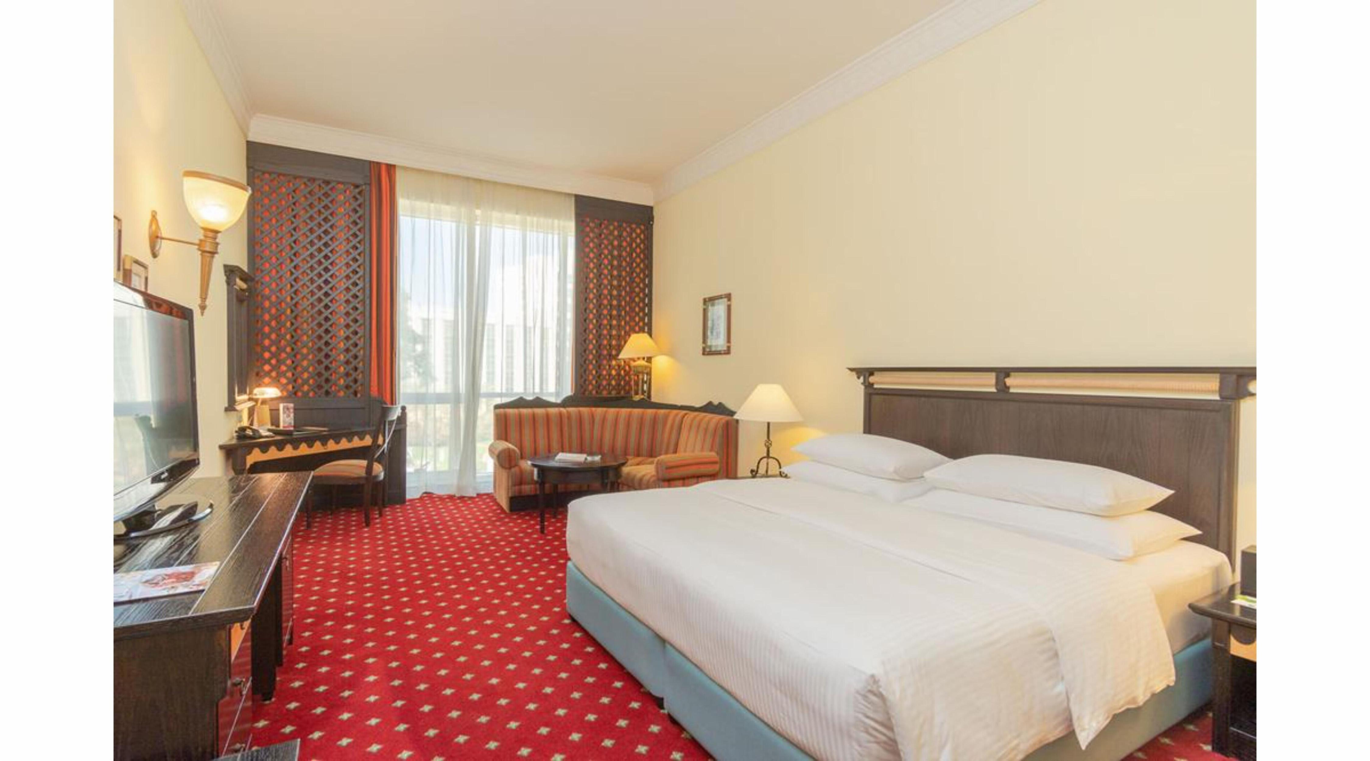 Millennium Airport Hotel Dubai - Tap to explore photos