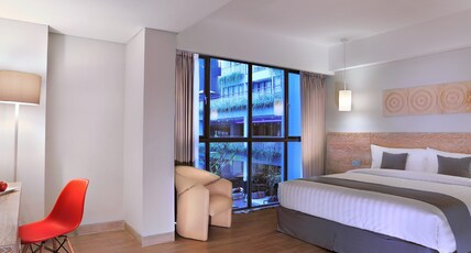 Hotel NEO Plus Kuta - Legian by ASTON Room Type - Deluxe Balcony Room Hotel NEO Plus Kuta - Legian by ASTON Room Type - Deluxe Balcony Room