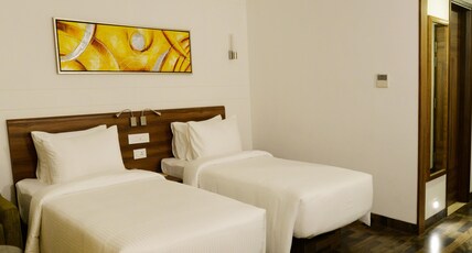 Lemon Tree Hotel Coimbatore Room Type - Deluxe Room (twin)