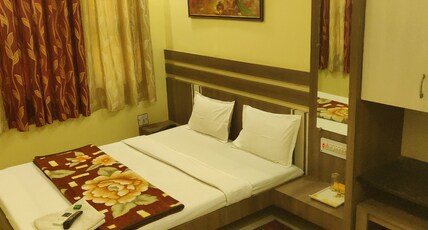 Hotel GuruKrupa Shegaon Room Type - Deluxe AC Double Bedroom