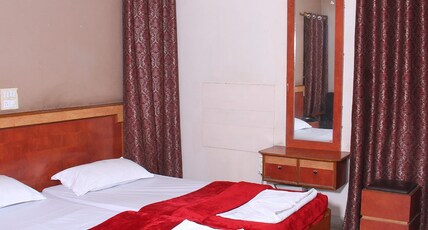 Hotel Saptagiri Deluxe Room Type - AC Rooms