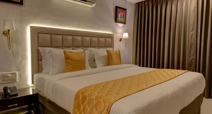ELITE HOTEL Room Type - AC Super Deluxe Room with Attached Balcony
