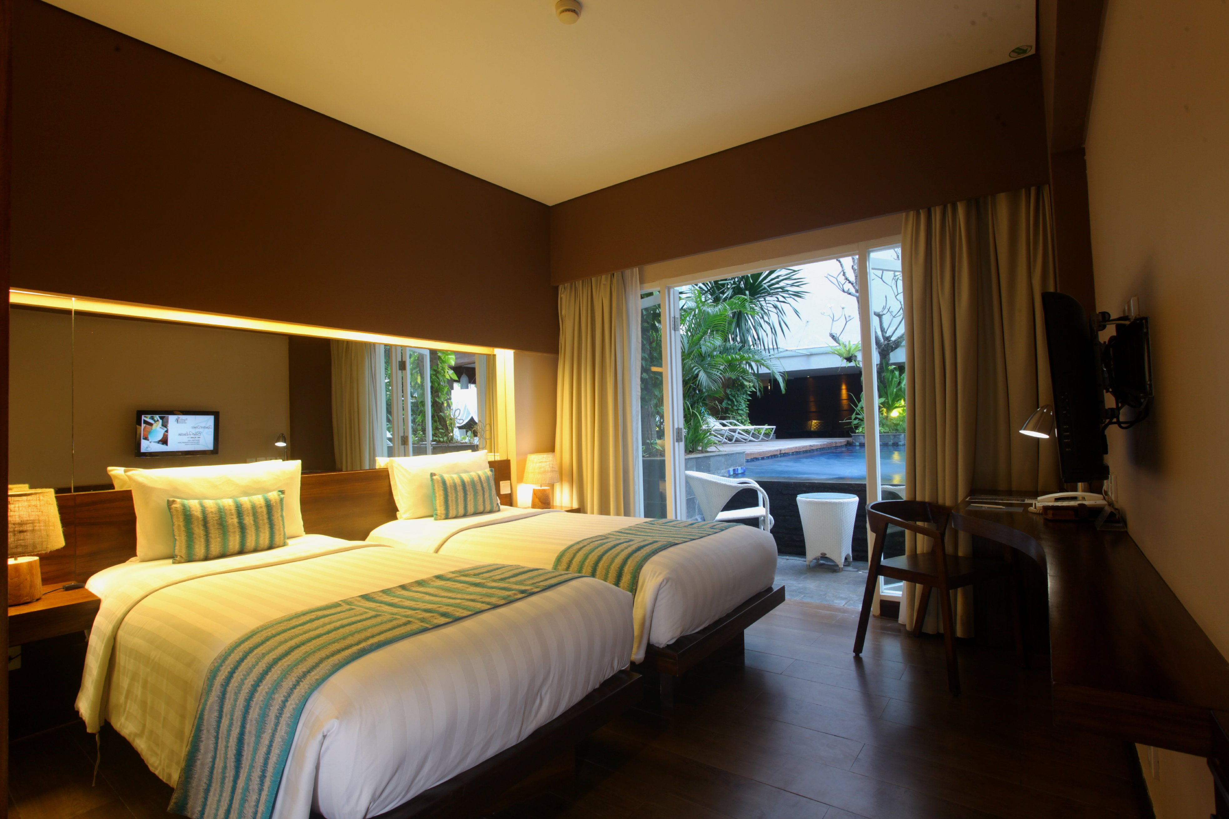 Grand Ixora Kuta Resort - Tap to explore photos