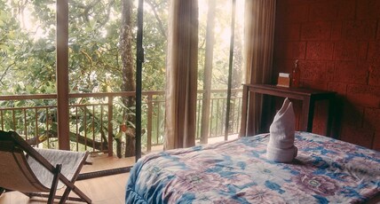 Tulsi Village Retreat | Treehouse & Cabin Stays Room Type - Cottage with Lake View