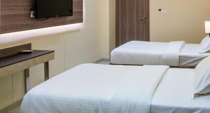 Hotel Surabhi Room Type - DELUXE TWIN ROOM Hotel Surabhi Room Type - DELUXE TWIN ROOM