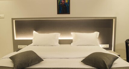 HOTEL SURABI Room Type - Premium AC Room