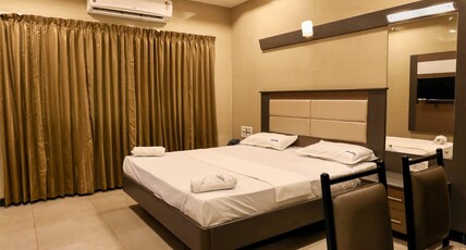 HOTEL RSN INTERNATIONAL Room Type - Four Bed AC ( Temple View )