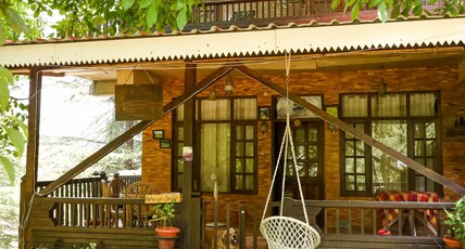 ROYAL SWISS COTTAGE - VILLA & COTTAGES Room Type - THE MAHARAJA SUITE