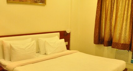 Hotel Shiv International Room Type - Deluxe AC Room Hotel Shiv International Room Type - Deluxe AC Room