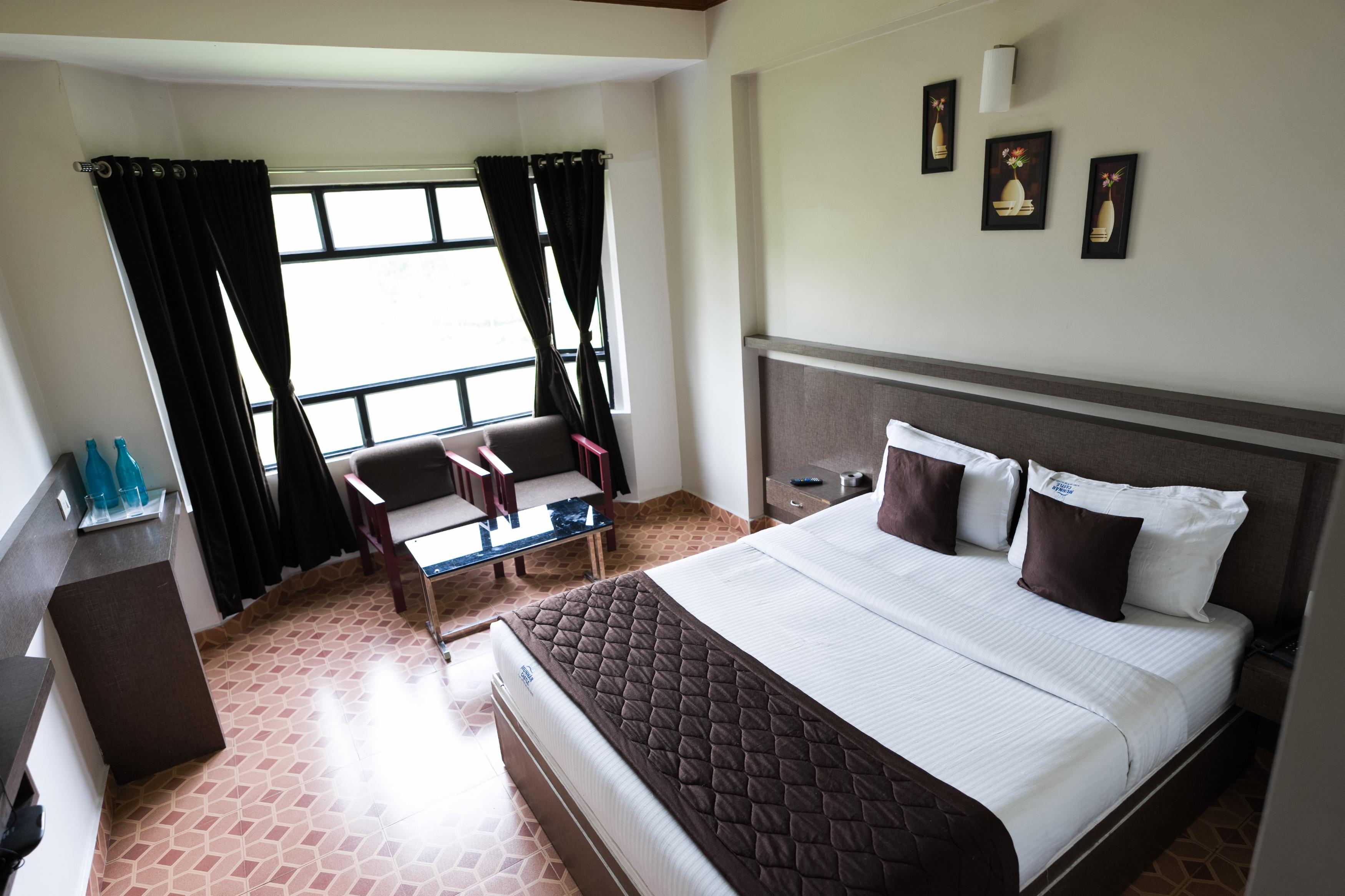 Munnar Castle - Tap to explore photos