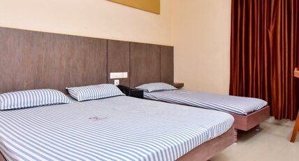 NAMASKAR HOTEL Room Type - Three Bed Non Ac Family Room