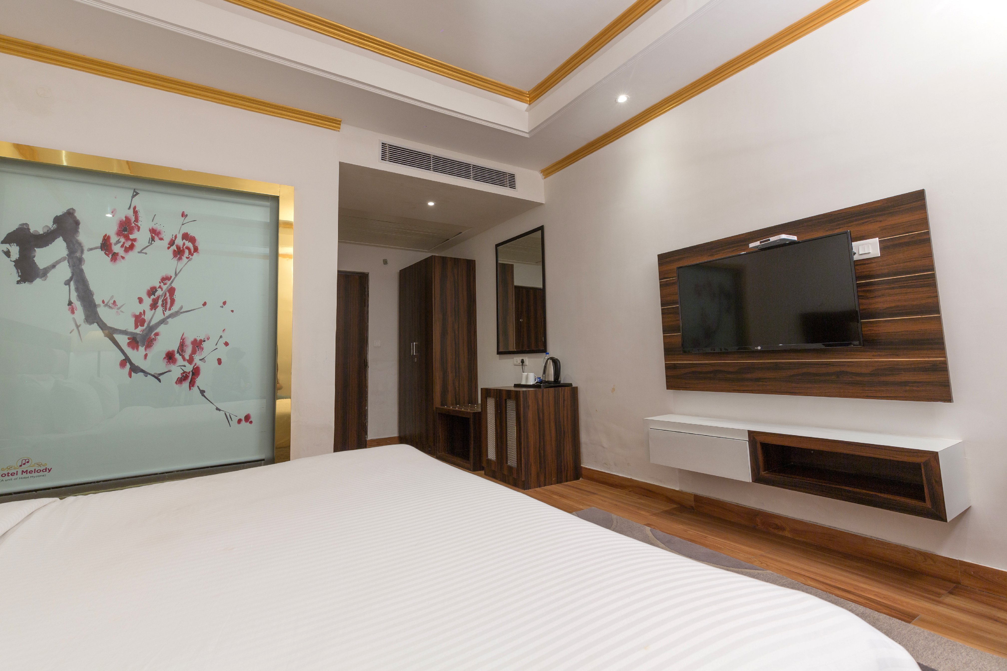 Melody ( A unit of Hotel Myzone ) - Tap to explore photos