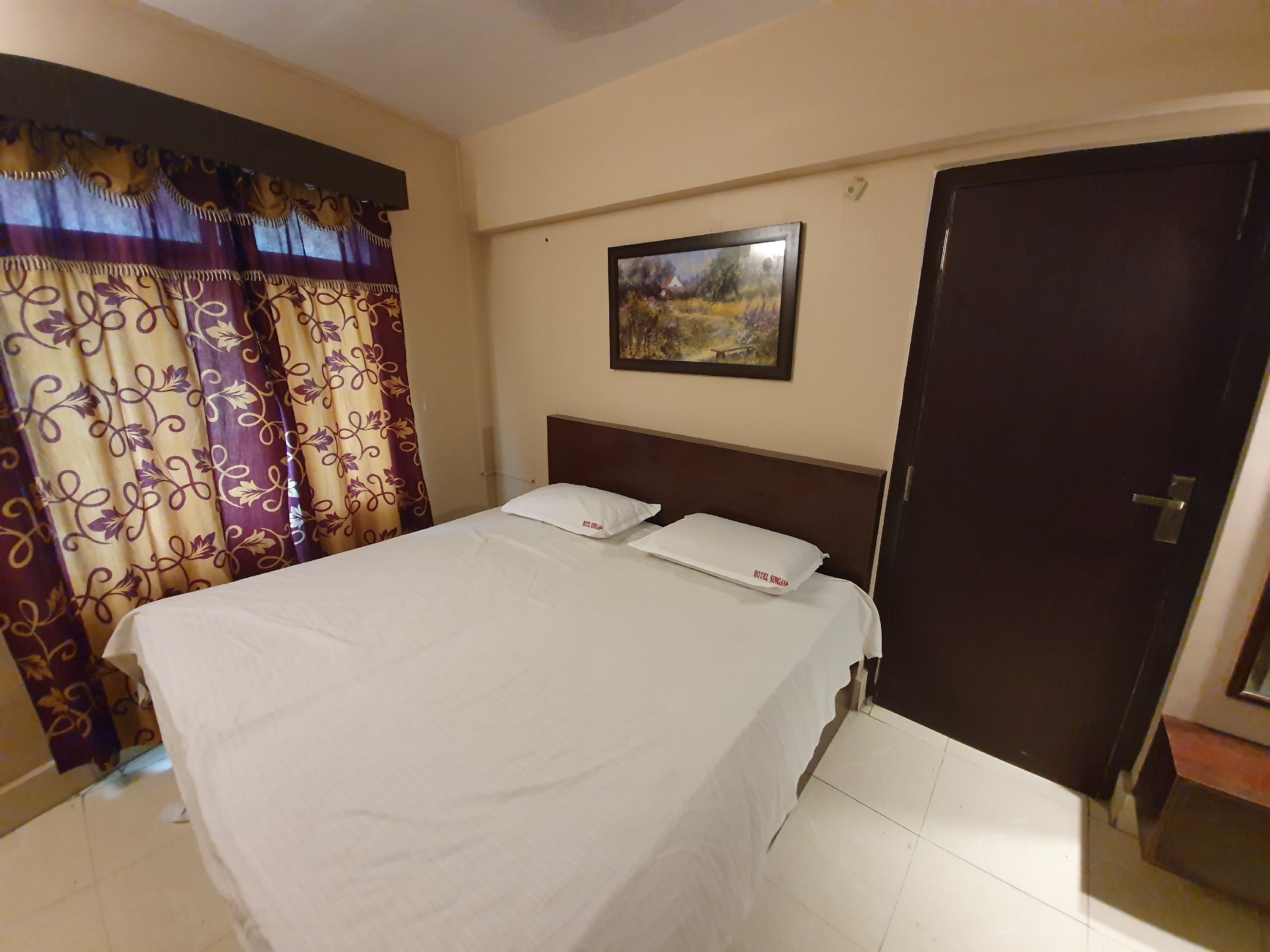 HOTEL SINGAAR Room Type - A/C Deluxe