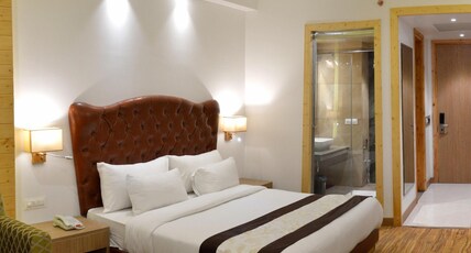 The Orchard Greens Resort (A centrally heated property) Room Type - Deluxe Room without balcony (Partial View) The Orchard Greens Resort (A centrally heated property) Room Type - Deluxe Room without balcony (Partial View)