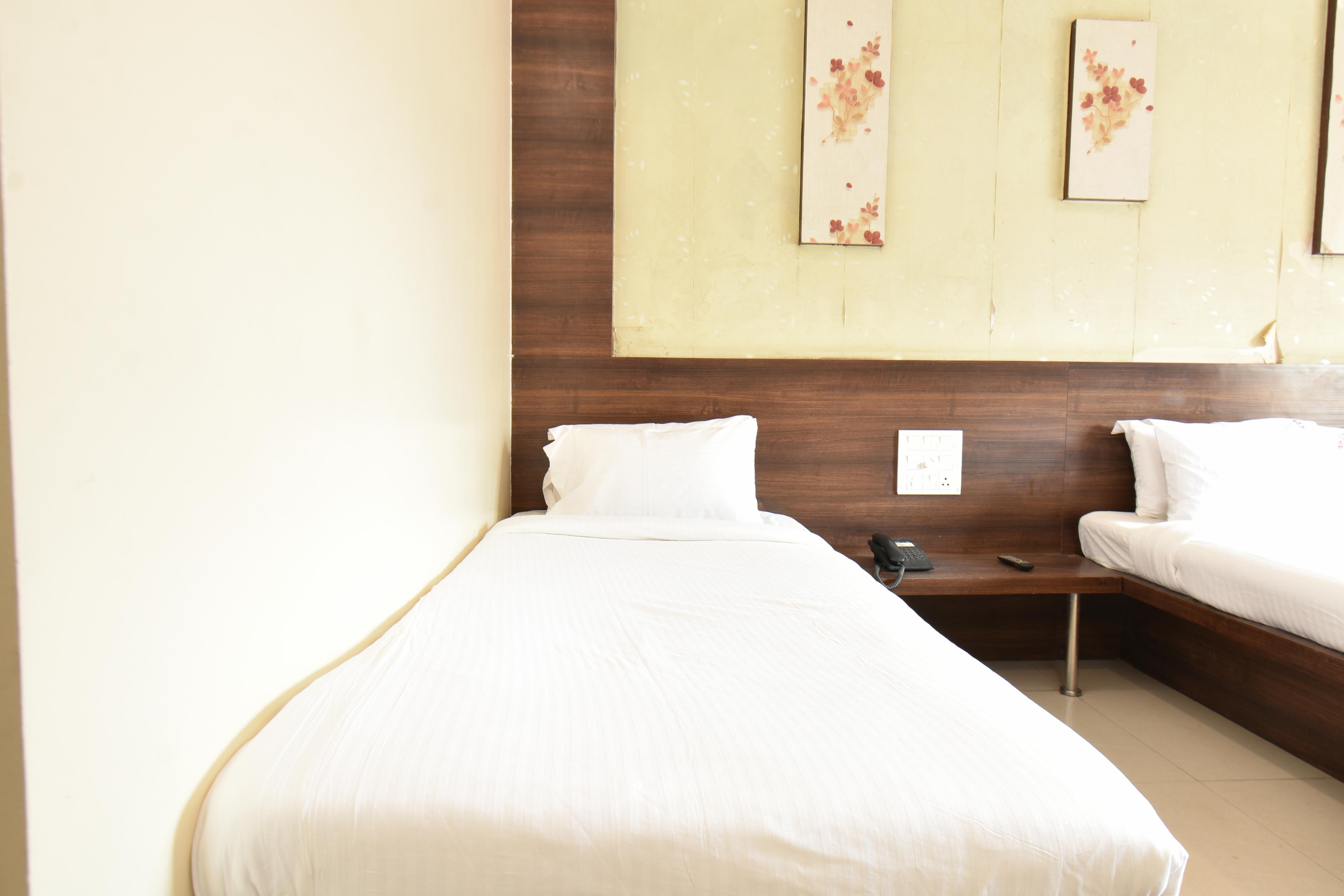 Hotel Sai Sparsh (Newly Renovated) - 150 Meters from Saibaba Temple - Tap to explore photos