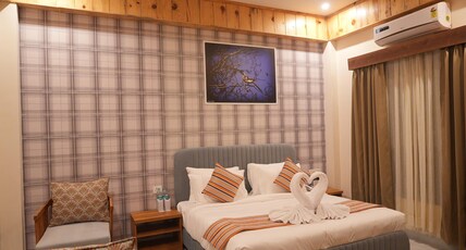 The Banyan Retreat By Excel Hotels & Resorts, Jim Corbett (Ramnagar) Room Type - HORNBILL SUITE WITH GARDEN VIEW The Banyan Retreat By Excel Hotels & Resorts, Jim Corbett (Ramnagar) Room Type - HORNBILL SUITE WITH GARDEN VIEW