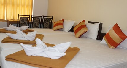 Hisham Residency | Rooms in an Apartment Room Type - STANDARD TRIPLE NON AC ROOM