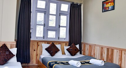 Rufina Lachung Deezong A Pure Veg Hotel Room Type - Triple Bed Room with Mountain View