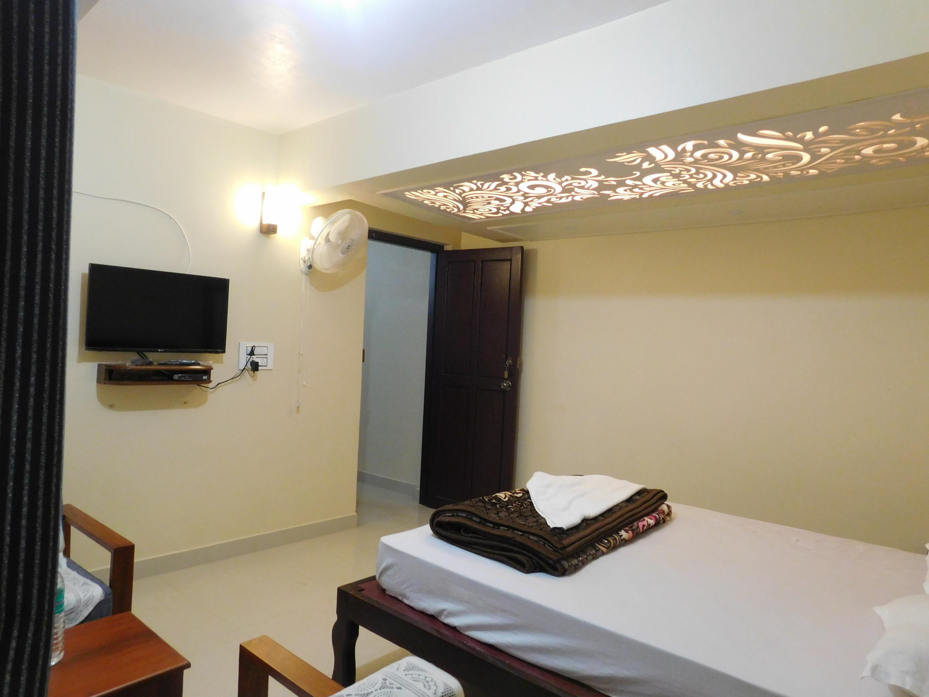Cauvery Homestay | Rooms & Caretaker - Tap to explore photos
