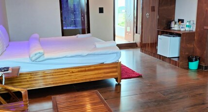 Hotel BonVilla Retreat and Resort, Kaziranga Room Type - Luxury Room Bath Tub and Balcony (Swimming pool view) Hotel BonVilla Retreat and Resort, Kaziranga Room Type - Luxury Room Bath Tub and Balcony (Swimming pool view)