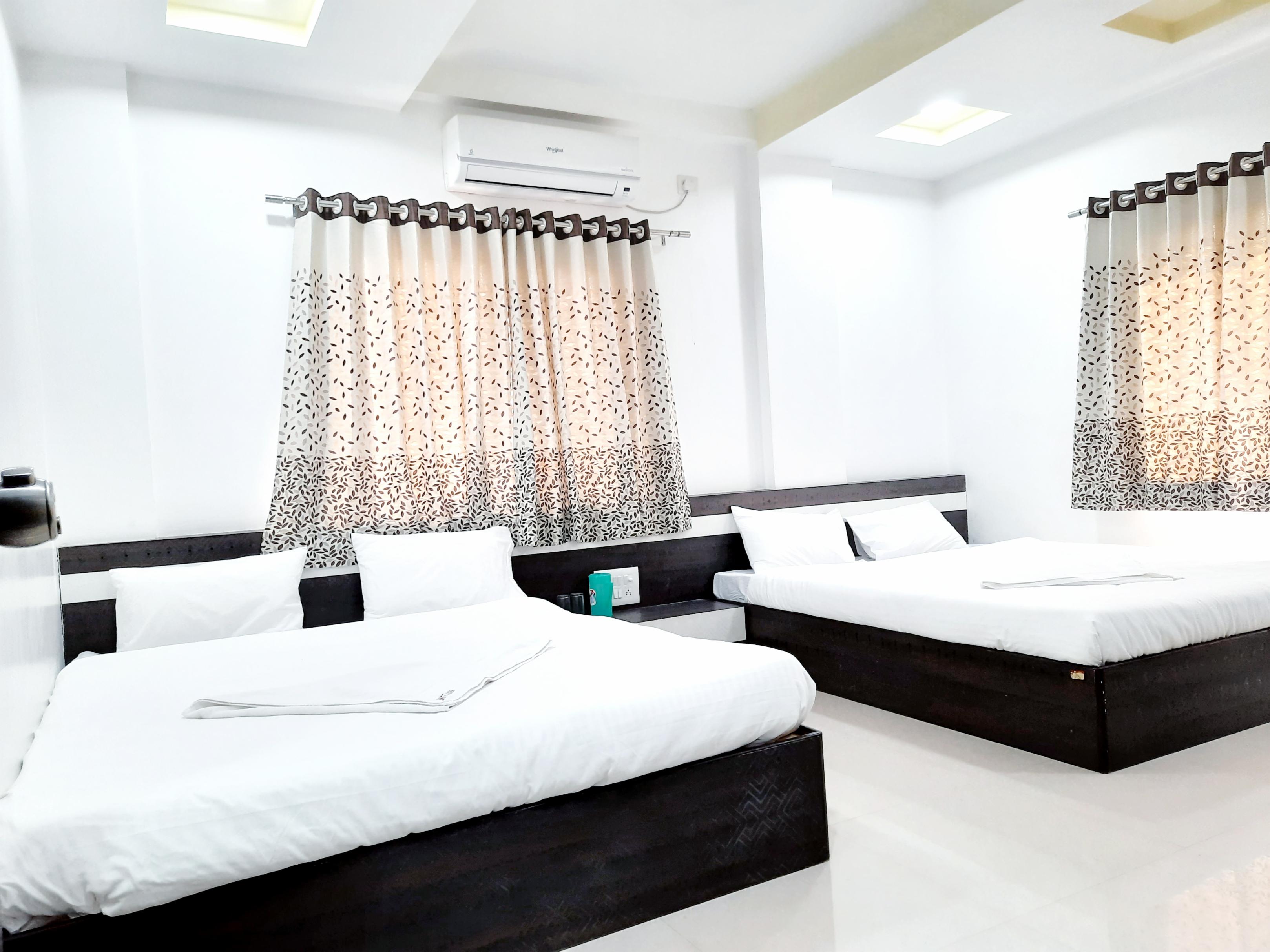 HOTEL UNITED HOUSE Room Type - Premium Four Bed Non AC Rooms