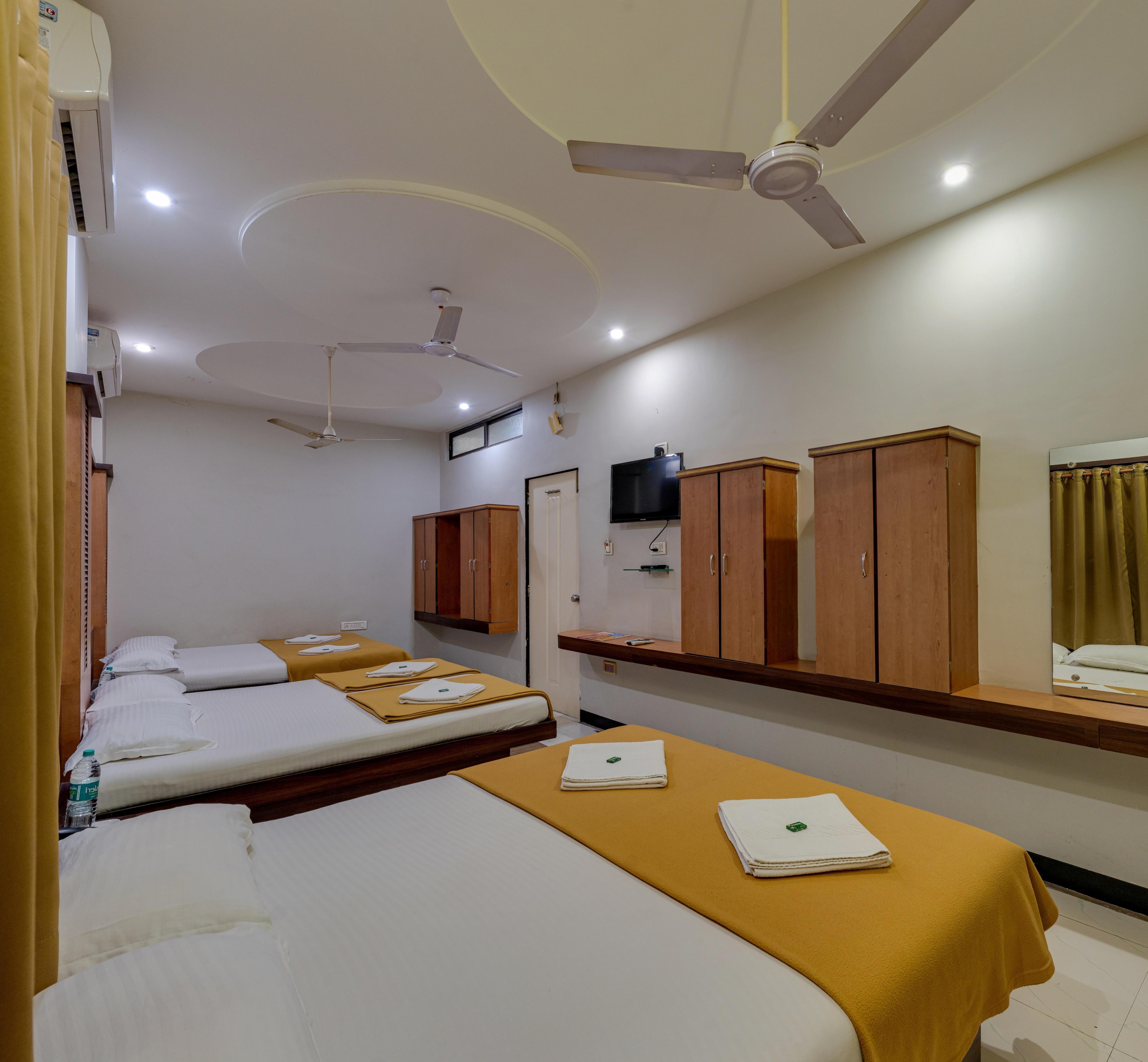 Hotel Adarsh Deluxe - Tap to explore photos