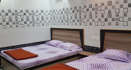 SREE MUKHYAPRANA RESIDENCY Room Type - Triple Bed AC Room