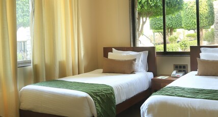 Fazlani Natures Nest- The Wellness Retreat Room Type - Garden View Twin room. Fazlani Natures Nest- The Wellness Retreat Room Type - Garden View Twin room.