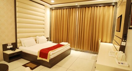 HOTEL PANCHSHEEL Room Type - Deluxe Room