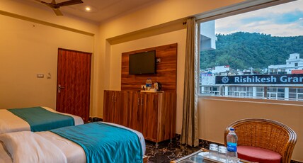 Hotel Rishikesh Grand by Kool-stays Room Type - Family Room || 1 Double and 1 Single Bed || Hotel Rishikesh Grand by Kool-stays Room Type - Family Room || 1 Double and 1 Single Bed ||