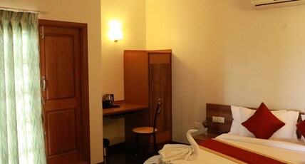 ZIONS AIRPORT HOTEL Room Type - Deluxe AC Room with Balcony