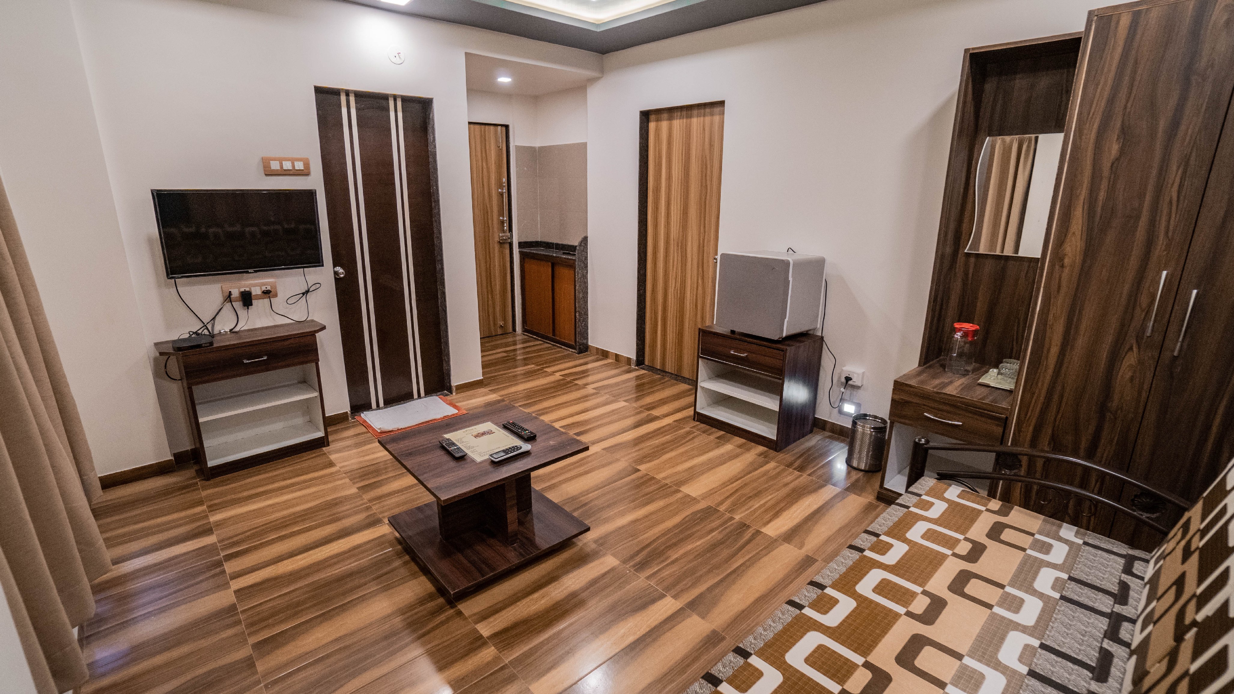 Pooja Villa Suites | Rooms & Pool - Tap to explore photos