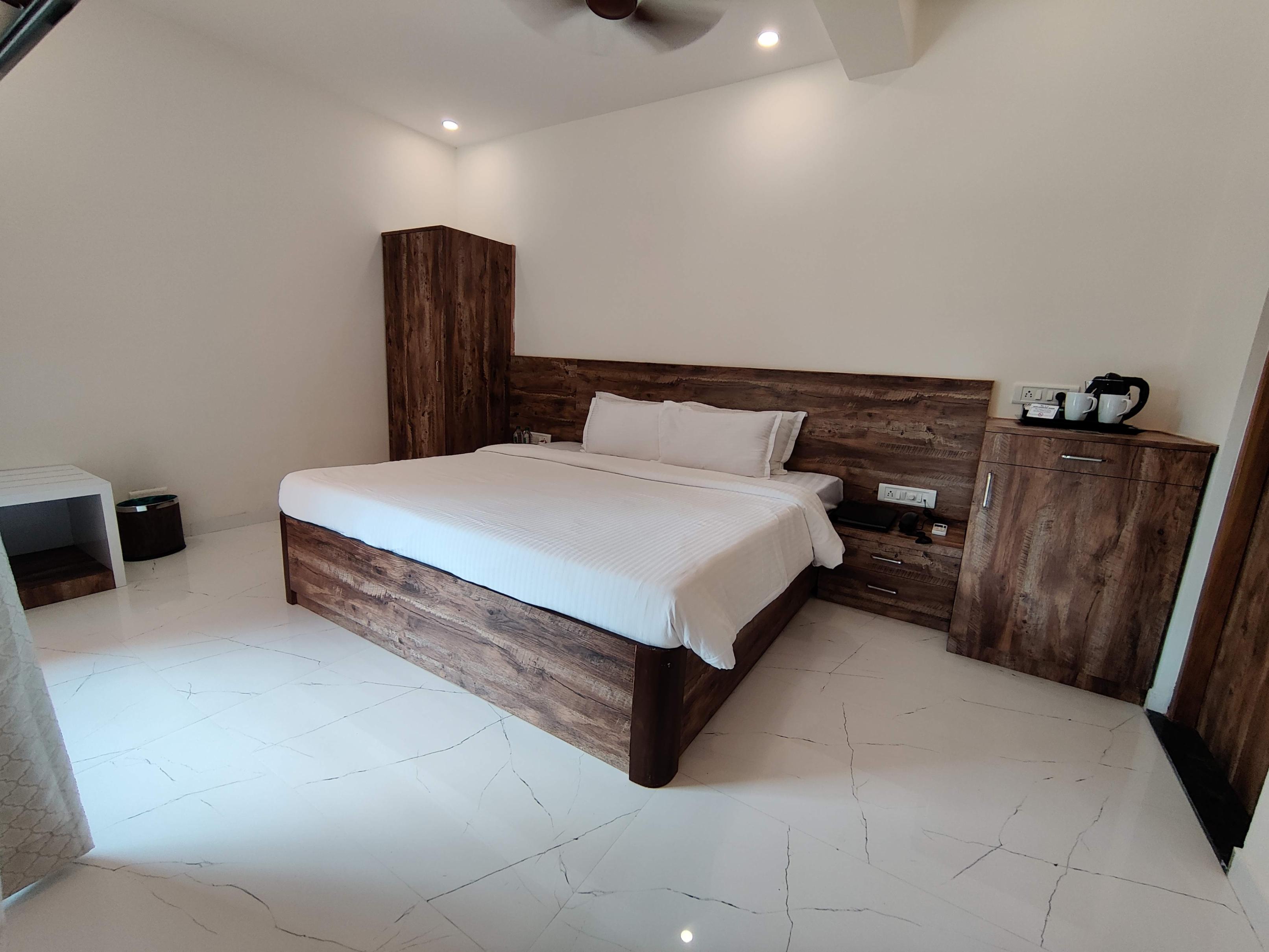 Pushp Vatika Resort & Lawns | Rooms & Pool - Tap to explore photos