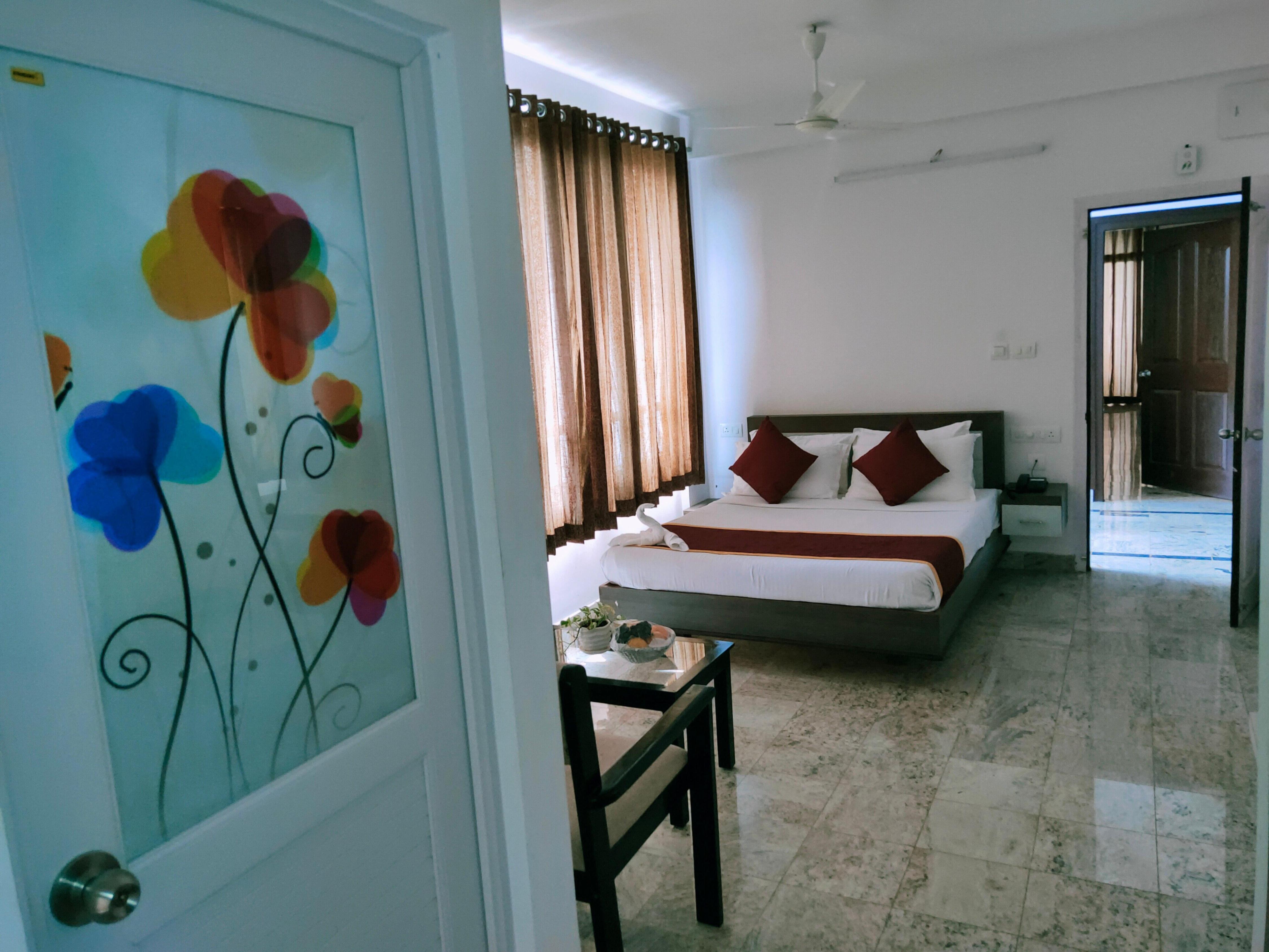 Munnar Summer Castle Room Type - Deluxe Non Ac  with Balcony